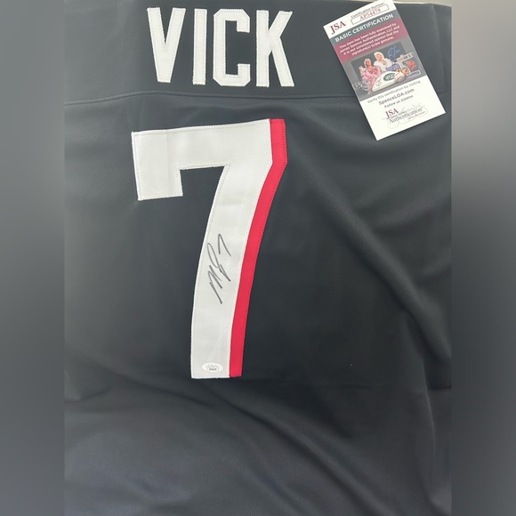 Vick signed Jersey with certificate